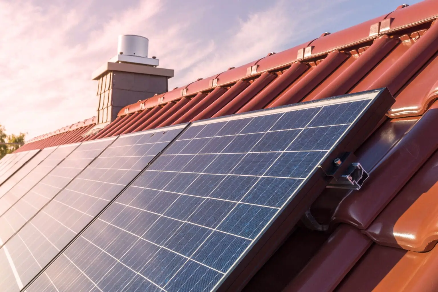 solar panesl or photovoltaic plant on the roof of a house